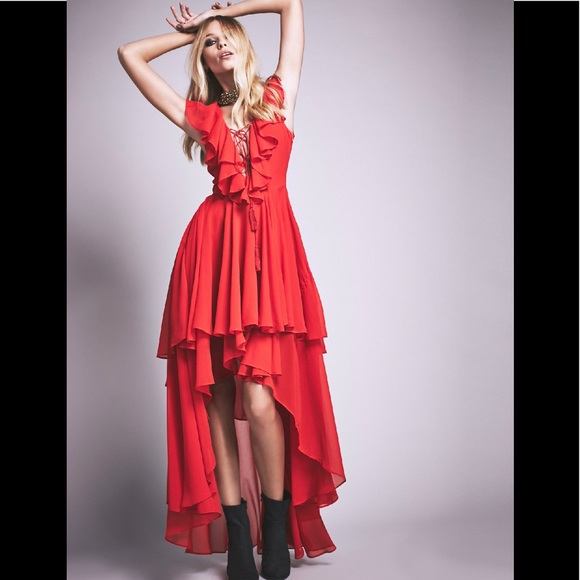 Boutique Dresses & Skirts - NWT red ruffled high low hem dress tie up bust